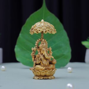Brass Ganesha Idol with Floral Canopy – Symbol of Wisdom & Auspicious Beginnings